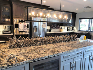 Custom driftwood centrepiece on granite countertop